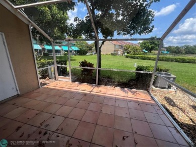 Spacious 3-Bedroom Townhome with Golf Course Views - West on Woodmont Country Club in Florida - for sale on GolfHomes.com, golf home, golf lot