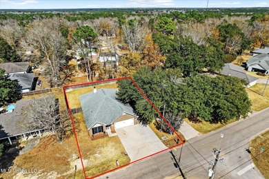 This well-maintained 3-bedroom, 2-bath brick home offers comfort on Diamondhead Country Club in Mississippi - for sale on GolfHomes.com, golf home, golf lot
