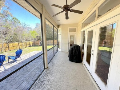 This beautiful Tommy Waters home is ideally located walking on Haile Plantation Golf and Country Club in Florida - for sale on GolfHomes.com, golf home, golf lot