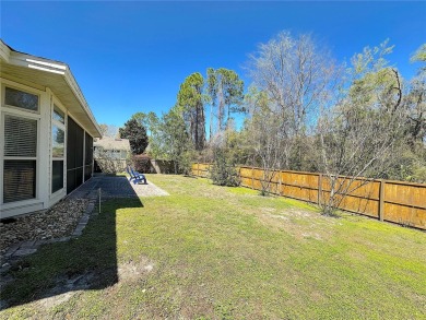 This beautiful Tommy Waters home is ideally located walking on Haile Plantation Golf and Country Club in Florida - for sale on GolfHomes.com, golf home, golf lot