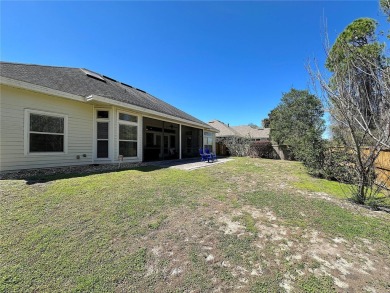 This beautiful Tommy Waters home is ideally located walking on Haile Plantation Golf and Country Club in Florida - for sale on GolfHomes.com, golf home, golf lot