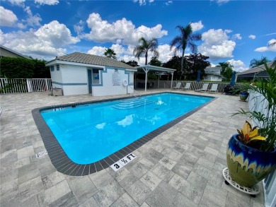 GOLF COURSE VIEWS - SPRAWLING ONE STORY - MAINTENANCE FREE - on Fox Hollow Golf Club in Florida - for sale on GolfHomes.com, golf home, golf lot