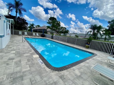 GOLF COURSE VIEWS - SPRAWLING ONE STORY - MAINTENANCE FREE - on Fox Hollow Golf Club in Florida - for sale on GolfHomes.com, golf home, golf lot