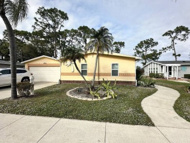 The Lot Rent for this home is $1,342.00/monthly.  Beautiful Palm on Del Tura Golf and Country Club in Florida - for sale on GolfHomes.com, golf home, golf lot