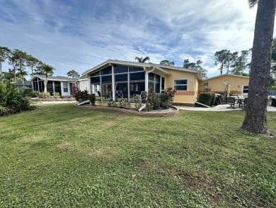 The Lot Rent for this home is $1,342.00/monthly.  Beautiful Palm on Del Tura Golf and Country Club in Florida - for sale on GolfHomes.com, golf home, golf lot