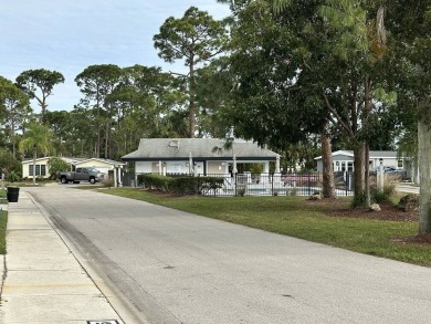 The Lot Rent for this home is $1,342.00/monthly.  Beautiful Palm on Del Tura Golf and Country Club in Florida - for sale on GolfHomes.com, golf home, golf lot