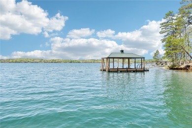 This exceptional property offers a seamless blend of thoughtful on The Cliffs At Keowee Springs in South Carolina - for sale on GolfHomes.com, golf home, golf lot