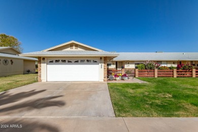 This stunning home is a perfect blend of elegance and on Sun City Country Club in Arizona - for sale on GolfHomes.com, golf home, golf lot