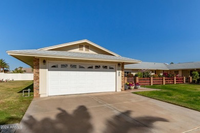 This stunning home is a perfect blend of elegance and on Sun City Country Club in Arizona - for sale on GolfHomes.com, golf home, golf lot