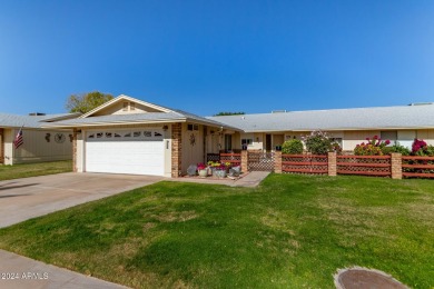 This stunning home is a perfect blend of elegance and on Sun City Country Club in Arizona - for sale on GolfHomes.com, golf home, golf lot