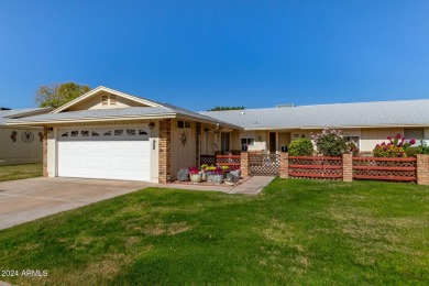 This stunning home is a perfect blend of elegance and on Sun City Country Club in Arizona - for sale on GolfHomes.com, golf home, golf lot