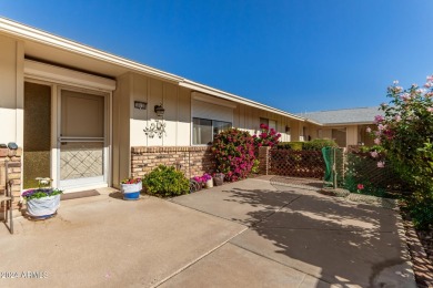 This stunning home is a perfect blend of elegance and on Sun City Country Club in Arizona - for sale on GolfHomes.com, golf home, golf lot