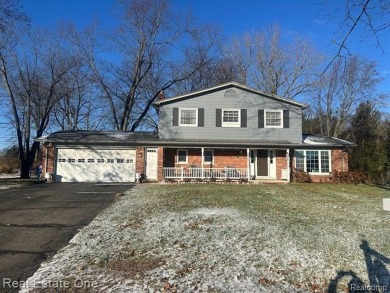 BEAUTIFULLY UPDATED SPACIOUS 4 BEDROOM, 2.5 BATH HOME ON AN on Silver Lake Golf Club in Michigan - for sale on GolfHomes.com, golf home, golf lot