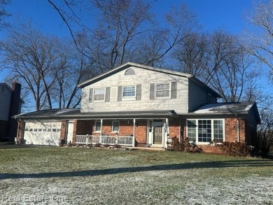 BEAUTIFULLY UPDATED SPACIOUS 4 BEDROOM, 2.5 BATH HOME ON AN on Silver Lake Golf Club in Michigan - for sale on GolfHomes.com, golf home, golf lot