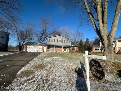 BEAUTIFULLY UPDATED SPACIOUS 4 BEDROOM, 2.5 BATH HOME ON AN on Silver Lake Golf Club in Michigan - for sale on GolfHomes.com, golf home, golf lot