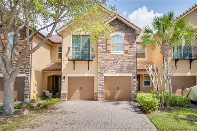 This Eagle Creek townhouse with an upstairs balcony overlooking on Eagle Creek Golf Club in Florida - for sale on GolfHomes.com, golf home, golf lot