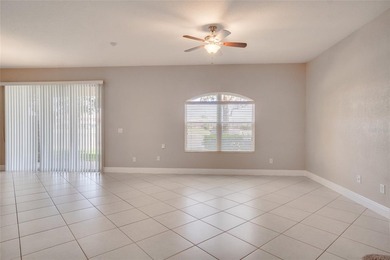 This Eagle Creek townhouse with an upstairs balcony overlooking on Eagle Creek Golf Club in Florida - for sale on GolfHomes.com, golf home, golf lot