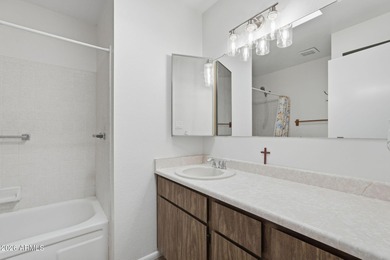 Immaculately cared for 2 bed, 2 bath plus bonus room in on Oakwood Golf Club  in Arizona - for sale on GolfHomes.com, golf home, golf lot