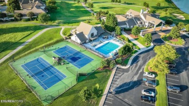 Want to be on the water with a dock right in your back yard but on Rarity Bay Country Club - Loudon in Tennessee - for sale on GolfHomes.com, golf home, golf lot