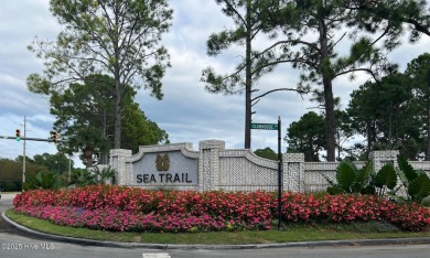 : Now available! This beautiful 4 bedroom and 3 full baths on Sea Trail Golf Resort in North Carolina - for sale on GolfHomes.com, golf home, golf lot