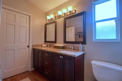 Bright and beautifully chic aptly describes this pristine 5 on East Lake Woodlands Country Club in Florida - for sale on GolfHomes.com, golf home, golf lot