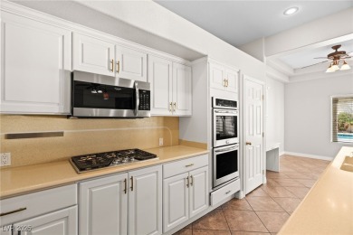 Live the comfortable lifestyle in this beautifully upgraded on Painted Desert Golf Club in Nevada - for sale on GolfHomes.com, golf home, golf lot