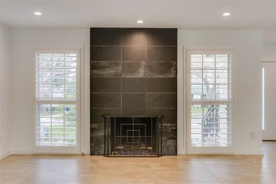 On a storybook, tree-lined lane in coveted Stevens Park Estates on Stevens Park Golf Course in Texas - for sale on GolfHomes.com, golf home, golf lot