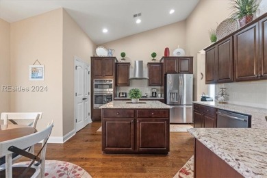 Former Model Home, situated on the 9th hole of the prestigious on Hilton Head Lakes Golf Club in South Carolina - for sale on GolfHomes.com, golf home, golf lot