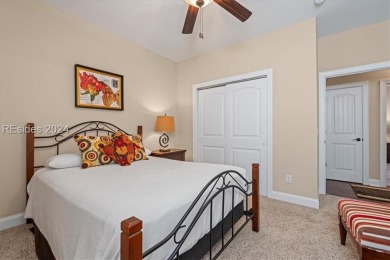 Former Model Home, situated on the 9th hole of the prestigious on Hilton Head Lakes Golf Club in South Carolina - for sale on GolfHomes.com, golf home, golf lot