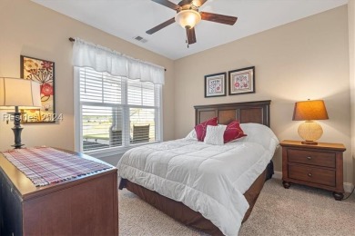 Former Model Home, situated on the 9th hole of the prestigious on Hilton Head Lakes Golf Club in South Carolina - for sale on GolfHomes.com, golf home, golf lot