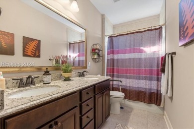 Former Model Home, situated on the 9th hole of the prestigious on Hilton Head Lakes Golf Club in South Carolina - for sale on GolfHomes.com, golf home, golf lot