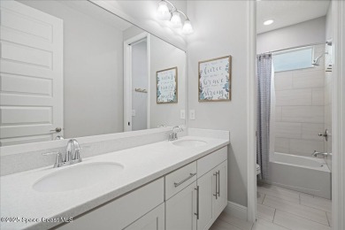 This stunning 2019-built home offers 4 spacious bedrooms PLUS a on Duran Golf Course in Florida - for sale on GolfHomes.com, golf home, golf lot