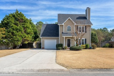 This home is instantly appealing and very well maintained. It on Beau Rivage Golf and Resort in North Carolina - for sale on GolfHomes.com, golf home, golf lot