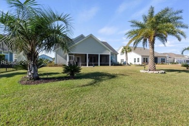 Former Model Home, situated on the 9th hole of the prestigious on Hilton Head Lakes Golf Club in South Carolina - for sale on GolfHomes.com, golf home, golf lot