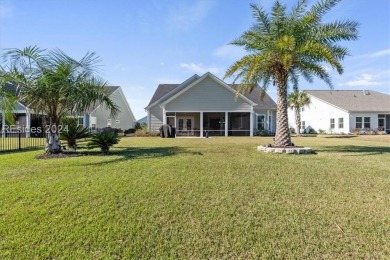 Former Model Home, situated on the 9th hole of the prestigious on Hilton Head Lakes Golf Club in South Carolina - for sale on GolfHomes.com, golf home, golf lot