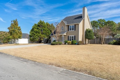 This home is instantly appealing and very well maintained. It on Beau Rivage Golf and Resort in North Carolina - for sale on GolfHomes.com, golf home, golf lot