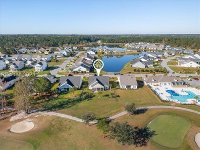 Former Model Home, situated on the 9th hole of the prestigious on Hilton Head Lakes Golf Club in South Carolina - for sale on GolfHomes.com, golf home, golf lot