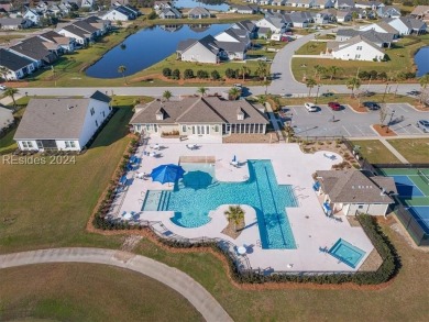Former Model Home, situated on the 9th hole of the prestigious on Hilton Head Lakes Golf Club in South Carolina - for sale on GolfHomes.com, golf home, golf lot