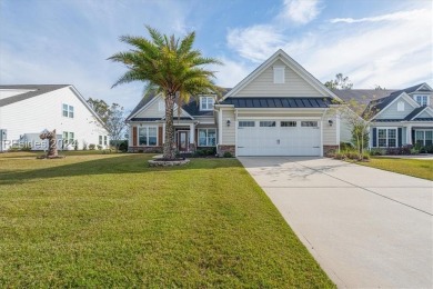 Former Model Home, situated on the 9th hole of the prestigious on Hilton Head Lakes Golf Club in South Carolina - for sale on GolfHomes.com, golf home, golf lot