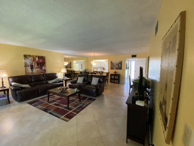 Beautiful unit with relaxing view from screen porch ready for on Indian Spring Golf and Country Club in Florida - for sale on GolfHomes.com, golf home, golf lot