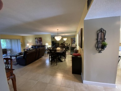 Beautiful unit with relaxing view from screen porch ready for on Indian Spring Golf and Country Club in Florida - for sale on GolfHomes.com, golf home, golf lot