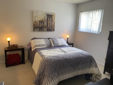 Beautiful unit with relaxing view from screen porch ready for on Indian Spring Golf and Country Club in Florida - for sale on GolfHomes.com, golf home, golf lot