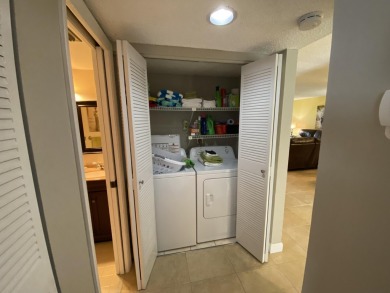 Beautiful unit with relaxing view from screen porch ready for on Indian Spring Golf and Country Club in Florida - for sale on GolfHomes.com, golf home, golf lot