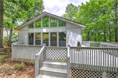 Tucked into the natural beauty of Bent Tree, this charming on Bent Tree Golf Course in Georgia - for sale on GolfHomes.com, golf home, golf lot