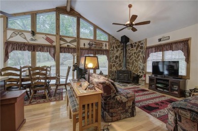 Tucked into the natural beauty of Bent Tree, this charming on Bent Tree Golf Course in Georgia - for sale on GolfHomes.com, golf home, golf lot