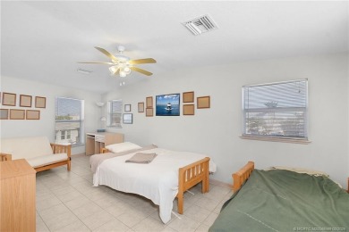 Waterfront Custom Built Home with 48 feet on a canal.  Carefree on Island Dunes Country Club in Florida - for sale on GolfHomes.com, golf home, golf lot