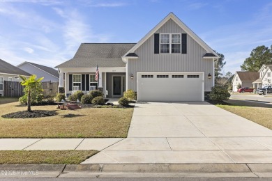 Charming 4-Bedroom Home with Solar Power on a Corner Lot in on Magnolia Greens Golf Plantation in North Carolina - for sale on GolfHomes.com, golf home, golf lot