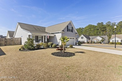 Charming 4-Bedroom Home with Solar Power on a Corner Lot in on Magnolia Greens Golf Plantation in North Carolina - for sale on GolfHomes.com, golf home, golf lot