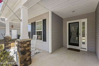 Charming 4-Bedroom Home with Solar Power on a Corner Lot in on Magnolia Greens Golf Plantation in North Carolina - for sale on GolfHomes.com, golf home, golf lot