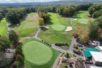 Welcome to 6 Woods Hollow Court, a bright and sunny end unit on Farmington Woods Country Club in Connecticut - for sale on GolfHomes.com, golf home, golf lot